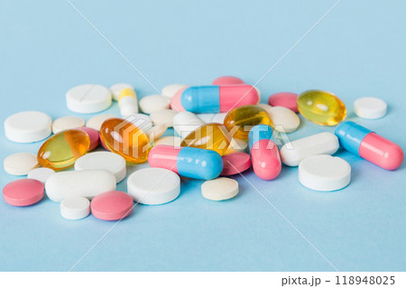 Many different colorful medication and pills perspective view. Set of many pills on colored background 118948025