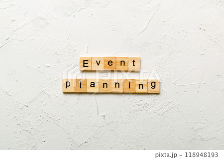 Event planning word written on wood block. Event planning text on table, concept 118948193