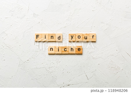 find your niche word written on wood block. find your niche text on table, concept find your niche word written on wood block. find your niche text on table, concept 118948206