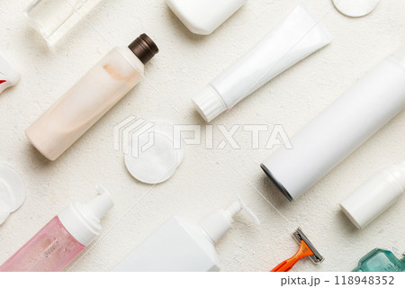 Mockup for bathing products top view flat lay, spa razor, toothpaste, soap, gel and other various accessories. Cosmetics for skin health. Bath Mockup for your logo Mockup for bathing products top view flat lay, spa razor, toothpaste, soap, gel and other various accessories. Cosmetics for skin health. Bath Mockup for your logo 118948352