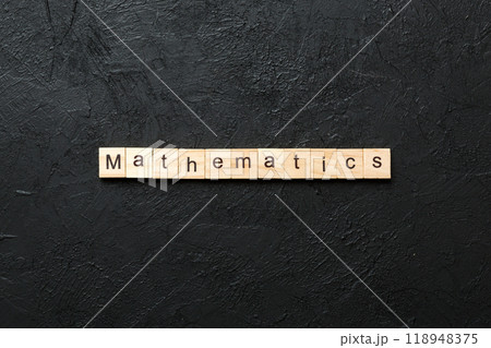 mathematics word written on wood block. mathematics text on cement table for your desing, concept 118948375