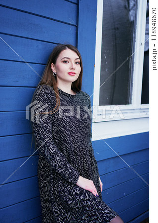 portrait of a young woman with long blond hair in a light dress in winter by  blue barn portrait of a young woman with long blond hair in a light dress in winter by  blue barn 118948670
