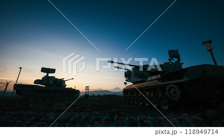Air defense system at sunset. Mobile air defence with radar Air defense system at sunset. Mobile air defence with radar 118949714