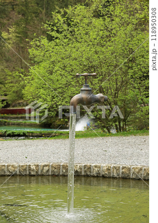 Fountain crane hanging in the air, city fountain in Switzerland Fountain crane hanging in the air, city fountain in Switzerland 118950308