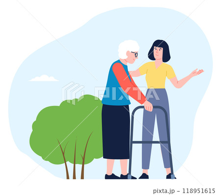 Woman walking with grandma outside. Senior people in park Woman walking with grandma outside. Senior people in park 118951615