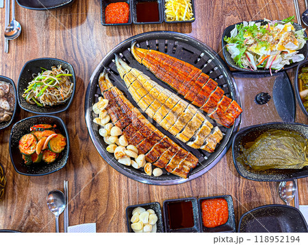Korean food. Grilled eel. Three flavors. Spicy sauce, salt, soy sauce Korean food. Grilled eel. Three flavors. Spicy sauce, salt, soy sauce 118952194