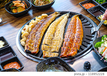 Korean food. Grilled eel. Three flavors. Spicy sauce, salt, soy sauce Korean food. Grilled eel. Three flavors. Spicy sauce, salt, soy sauce 118952228