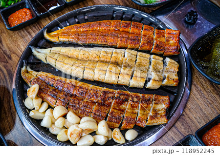 Korean food. Grilled eel. Three flavors. Spicy sauce, salt, soy sauce Korean food. Grilled eel. Three flavors. Spicy sauce, salt, soy sauce 118952245