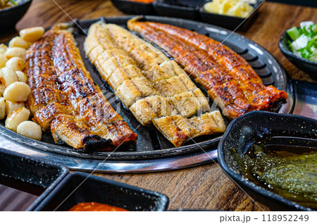 Korean food. Grilled eel. Three flavors. Spicy sauce, salt, soy sauce Korean food. Grilled eel. Three flavors. Spicy sauce, salt, soy sauce 118952249