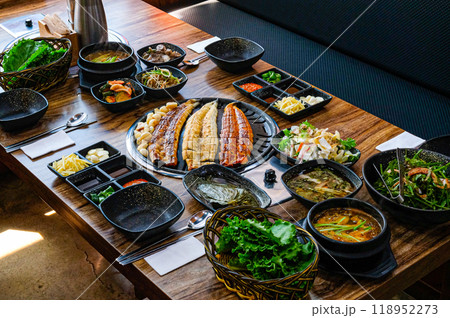 Korean food. Grilled eel. Three flavors. Spicy sauce, salt, soy sauce Korean food. Grilled eel. Three flavors. Spicy sauce, salt, soy sauce 118952273