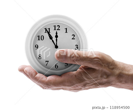 Classic round clock on senior hand isolated on white background. Aging problems concept Classic round clock on senior hand isolated on white background. Aging problems concept 118954500