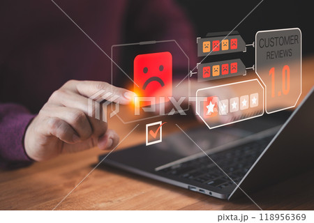 Customer touch virtual screen on angry emotion face, Bad review, client dislike service and quality, low rating, social media not good. Business service concept of customer experience dissatisfied. 118956369