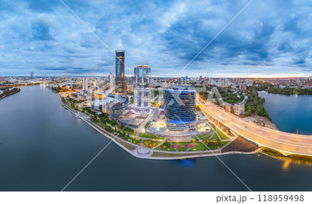 Yekaterinburg city and pond aerial panoramic view at summer or early autumn sunset. Night city in the early autumn or summer. 118959498