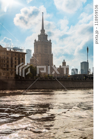 high-rise stalinist building near river at summer sunset in Moscow, Russia. Historic name is Hotel Ukraine. 118959536