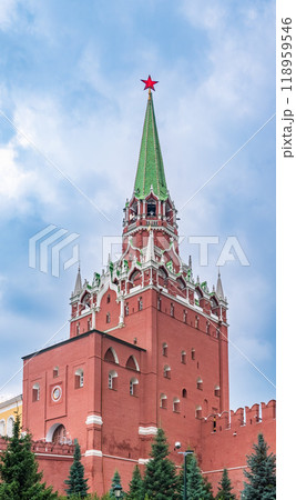 Troitskaya tower of Moscow Kremlin on a blue sky background in sunny summer day 118959546