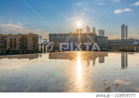 View of Berezhkovskaya Embankment in Moscow with reflection on a mirror stone surface View of Berezhkovskaya Embankment in Moscow with reflection on a mirror stone surface 118959777
