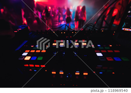glowing colorful buttons on mixer DJ party night club for dancing 118969540