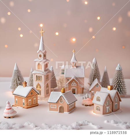 Snow-covered village of several houses with Christmas lights 118971538