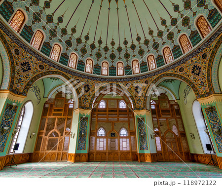 Interior of Taza Pir Mosque in Baku, Azerbaijan, with ornate dome and intricate architecture 118972122