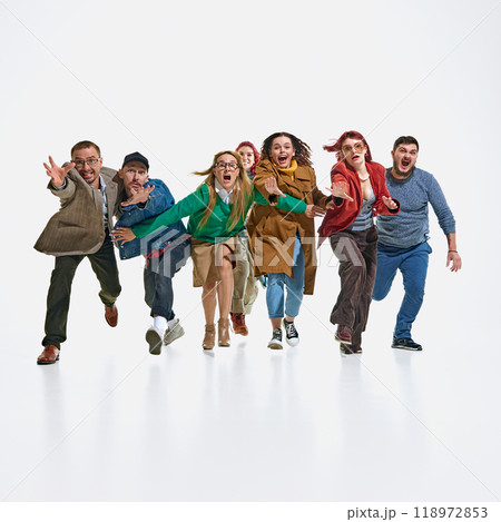Chaotic Black Friday scene depicting group of young emotional people expressing their excitement to get the best discounts. 118972853