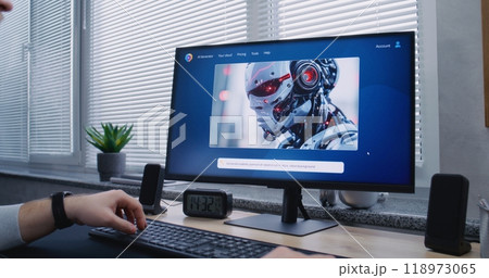 Adult man types prompt in artificial intelligence chatbot on PC. Adult man types prompt in artificial intelligence chatbot on PC. 118973065