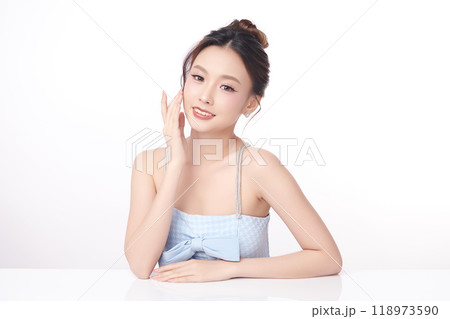 Beautiful young asian woman with clean fresh skin on white background, Face care, Facial treatment, Cosmetology, beauty and spa, Asian women portrait. Beautiful young asian woman with clean fresh skin on white background, Face care, Facial treatment, Cosmetology, beauty and spa, Asian women portrait. 118973590