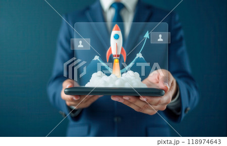 Business rocket growth concept with rocket launch graphic on tablet, symbolizing startup success, rapid income increase, and upward financial trends in corporate strategy Business rocket growth concept with rocket launch graphic on tablet, symbolizing startup success, rapid income increase, and upward financial trends in corporate strategy 118974643