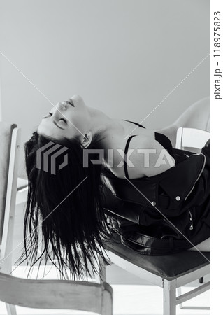 Beautiful Fashion Woman Brunette On Chairs Black And White Photography 118975823