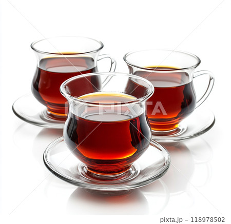 Red Turkish tea in a traditional glass, isolated on a white background.  118978502