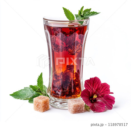 Red Turkish tea in a traditional glass, isolated on a white background.  118978517