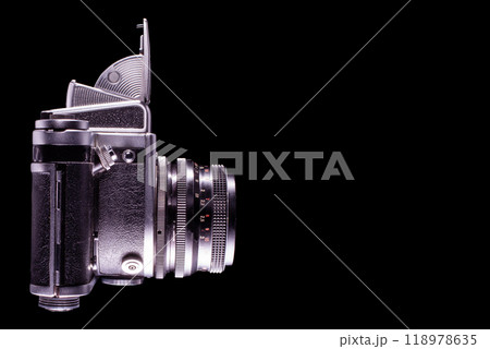 Side view of vintage camera isolated on black background 118978635
