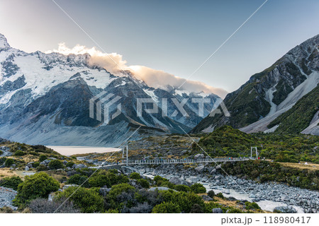 View of suspension bridge with mountain range on Hooker Valley Track in national park at New Zealand 118980417