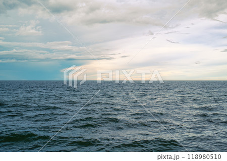 Tropical sea with deep blue wave and small fishing boat 118980510