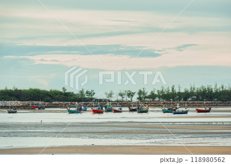 Traditional fishing boat moored on the beach in tropical sea Traditional fishing boat moored on the beach in tropical sea 118980562