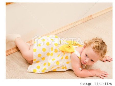 Beautiful blonde baby girl playing in kindergarten Beautiful blonde baby girl playing in kindergarten 118981120