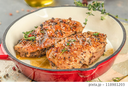 roast duck breasts. gourmet duck breast filet with skin in pan roast duck breasts. gourmet duck breast filet with skin in pan 118981203