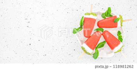 Strawberry ice cream popsicles in a bowl with ice on a white background, Vegan diet food concept 118981262