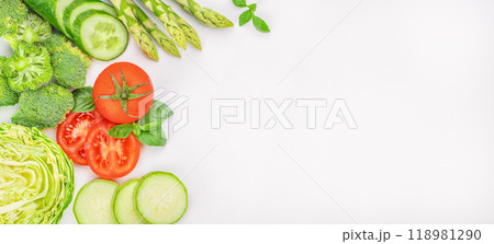 Organic green vegetables on a white background top view. copy space Organic green vegetables on a white background top view. copy space 118981290