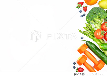 diet food of fresh fruits and dumbbells. clean eating for weight loss. top view. copy space diet food of fresh fruits and dumbbells. clean eating for weight loss. top view. copy space 118981365