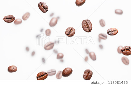 roasted coffee beans on white background. top view 118981456