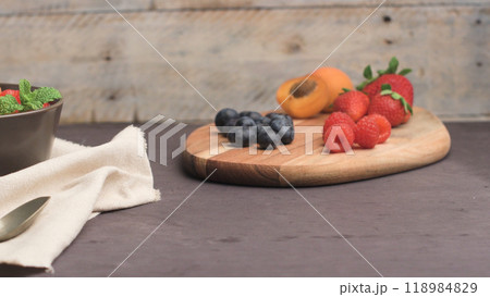 Yogurt with baked granola and berries Yogurt with baked granola and berries 118984829