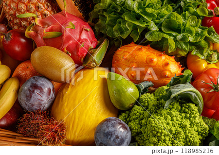 A Vibrant Array of Fresh and Colorful Fruits and Vegetables Lavishly Displayed for All A Vibrant Array of Fresh and Colorful Fruits and Vegetables Lavishly Displayed for All 118985216