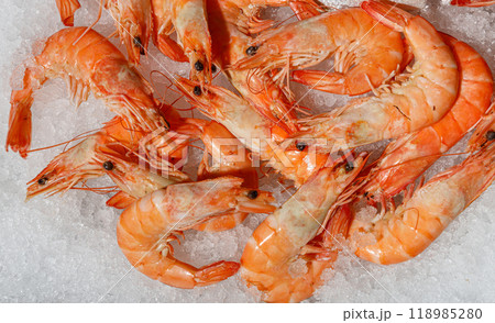 Experience the exquisite Fresh Seafood Shrimp beautifully presented on Ice for Culinary Delights 118985280