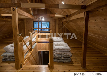 Japanese Futon tatami bed and blanket on house top wooden floor Japanese Futon tatami bed and blanket on house top wooden floor 118988825