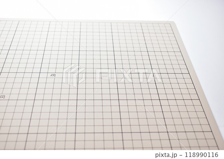 gray cutting mat board on white background with line and scale measure guide pattern 118990116