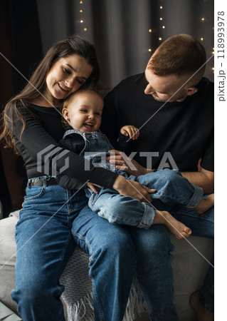 Happy family enjoying quality time together at home 118993978