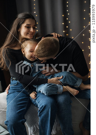 Happy family enjoying quality time together at home Happy family enjoying quality time together at home 118993979