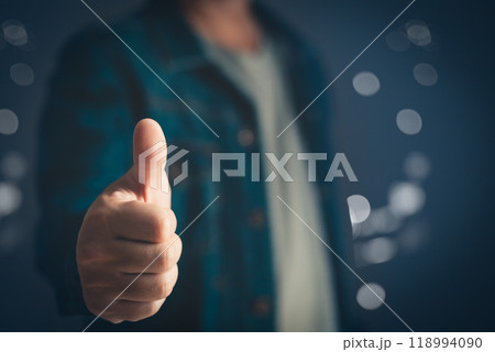 Portrait of a businessman in a casual wear standing thumbs up, half body and not showing face. 118994090
