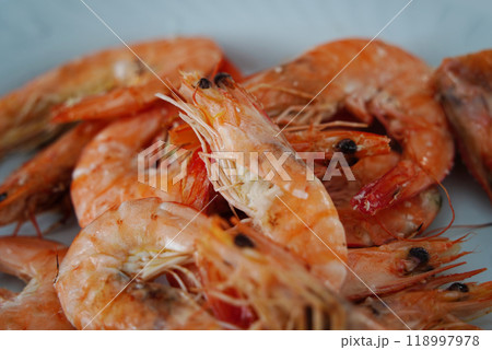 Boiled shrimps on a plate. Close-up. Boiled shrimps on a plate. Close-up. 118997978