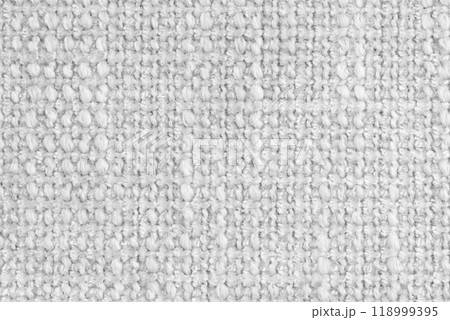 Texture of white jacquard fabric of rough weave, cloth structure background, close up, macro 118999395